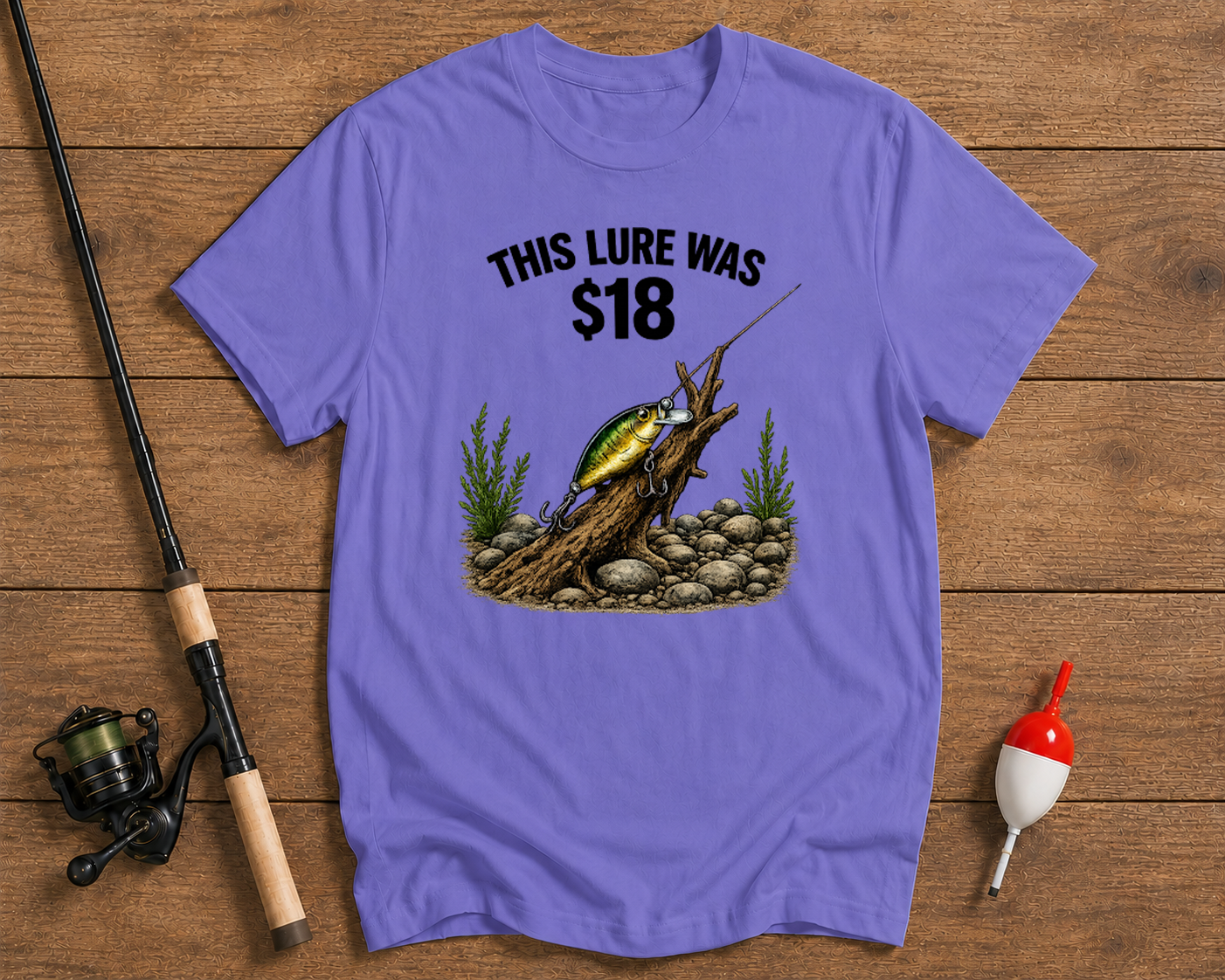 Funny 18 Dollar Lure fishing shirt in lavender with a snagged fishing lure illustration by Funky Fish Club