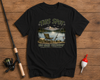 This Spot Was Good Yesterday fishing t-shirt in black featuring a lakeside fishing scene by Funky Fish Club