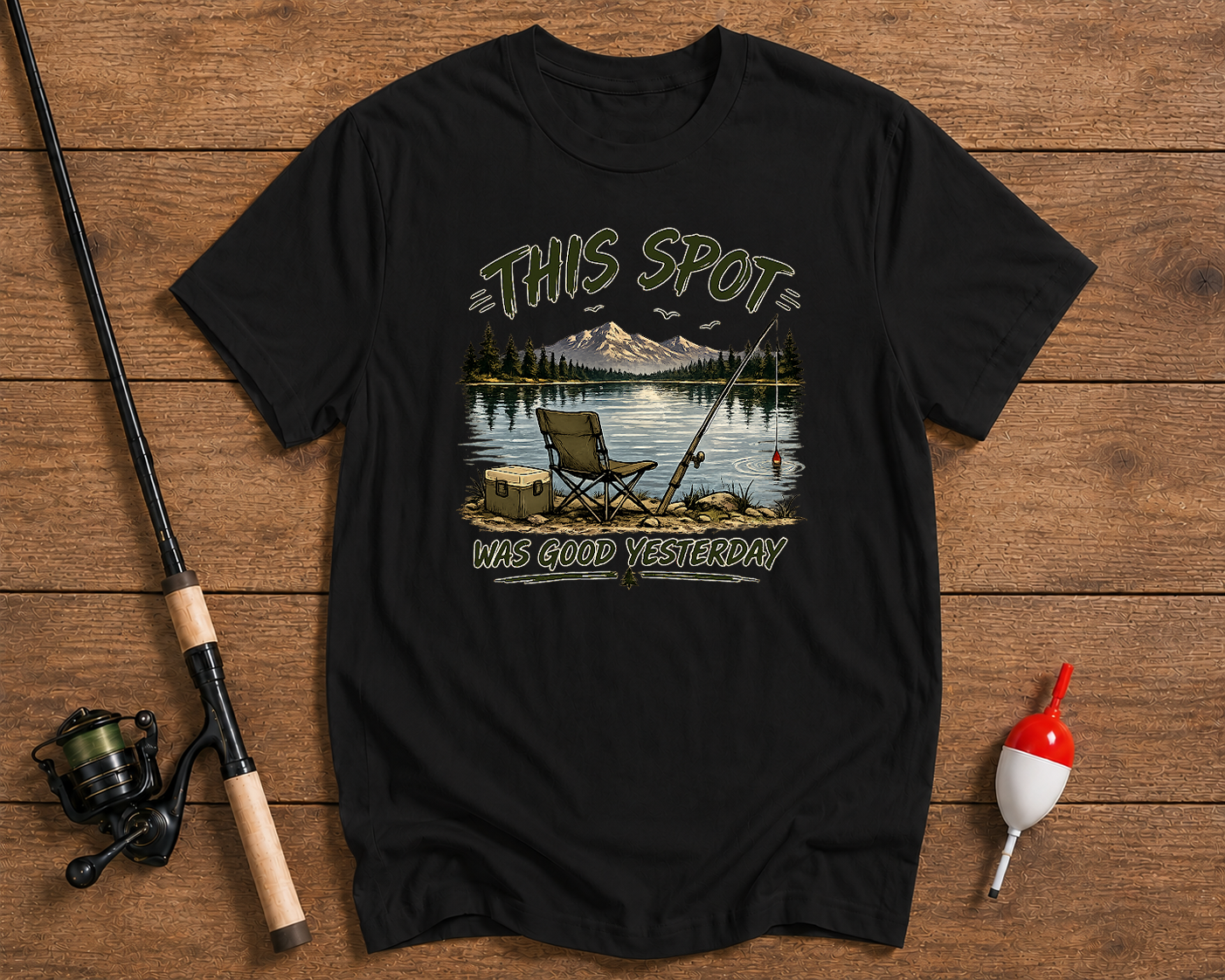 This Spot Was Good Yesterday fishing t-shirt in black featuring a lakeside fishing scene by Funky Fish Club