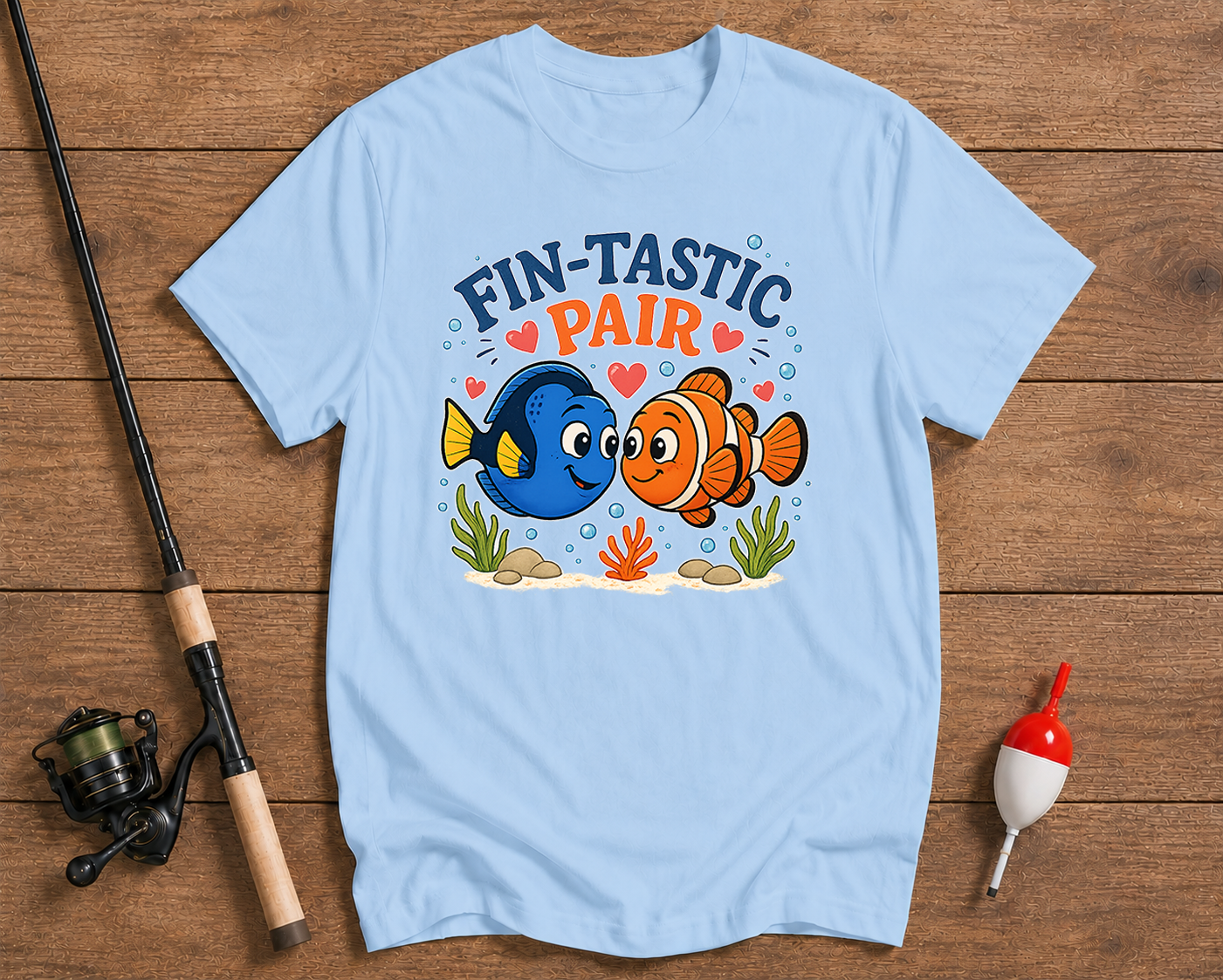 Cute tropical fish fishing t-shirt in sky blue with Fin-Tastic Pair design by Funky Fish Club