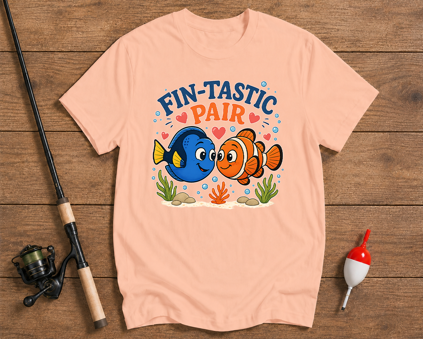 Fin-Tastic Pair fishing t-shirt in salmon featuring playful tropical fish artwork by Funky Fish Club