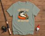 Fish Are On Vacation fishing graphic tee in sage green featuring a relaxed bass with a tropical drink by Funky Fish Club