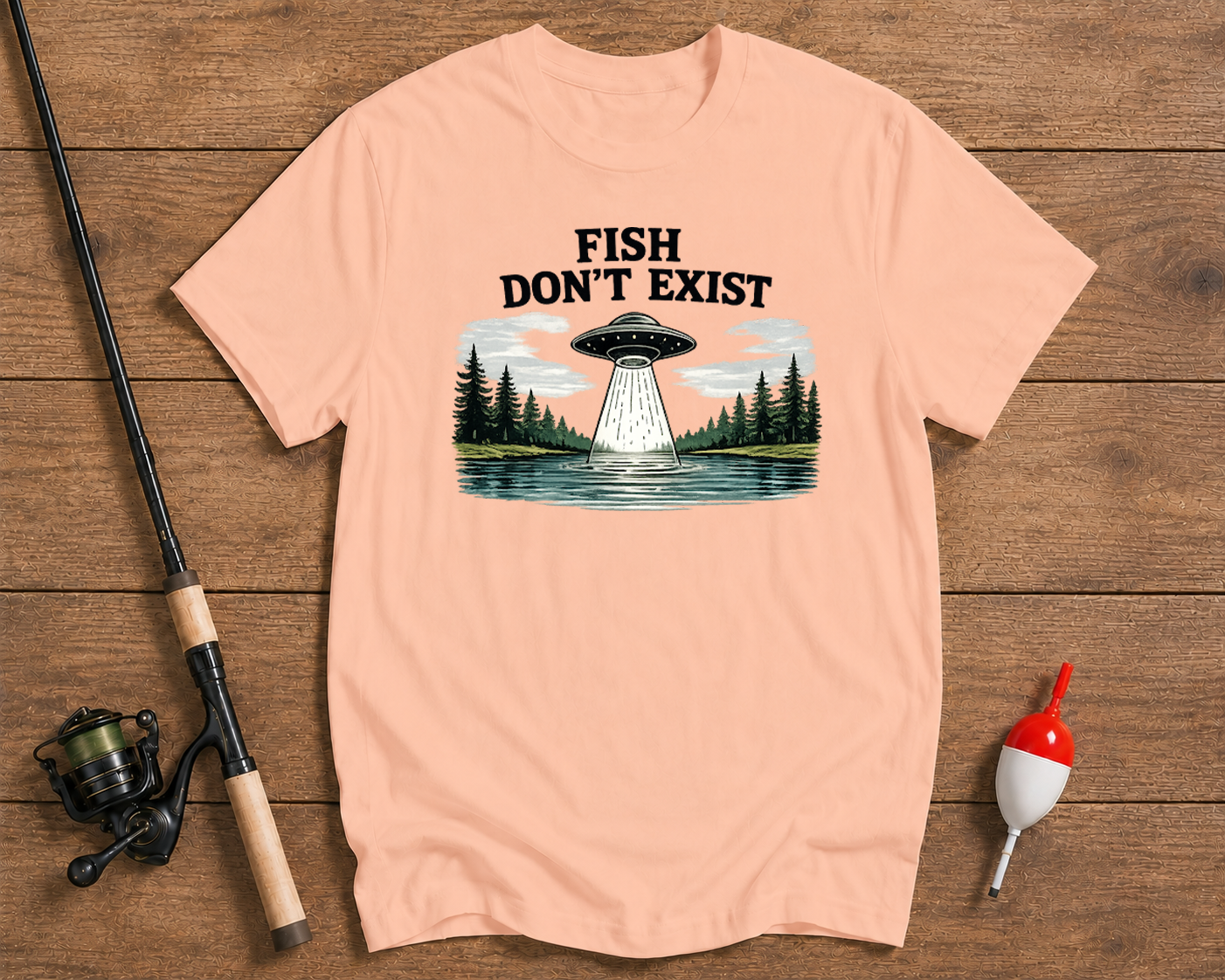 Fish Don't Exist fishing shirt in salmon featuring UFO and lake artwork by Funky Fish Club